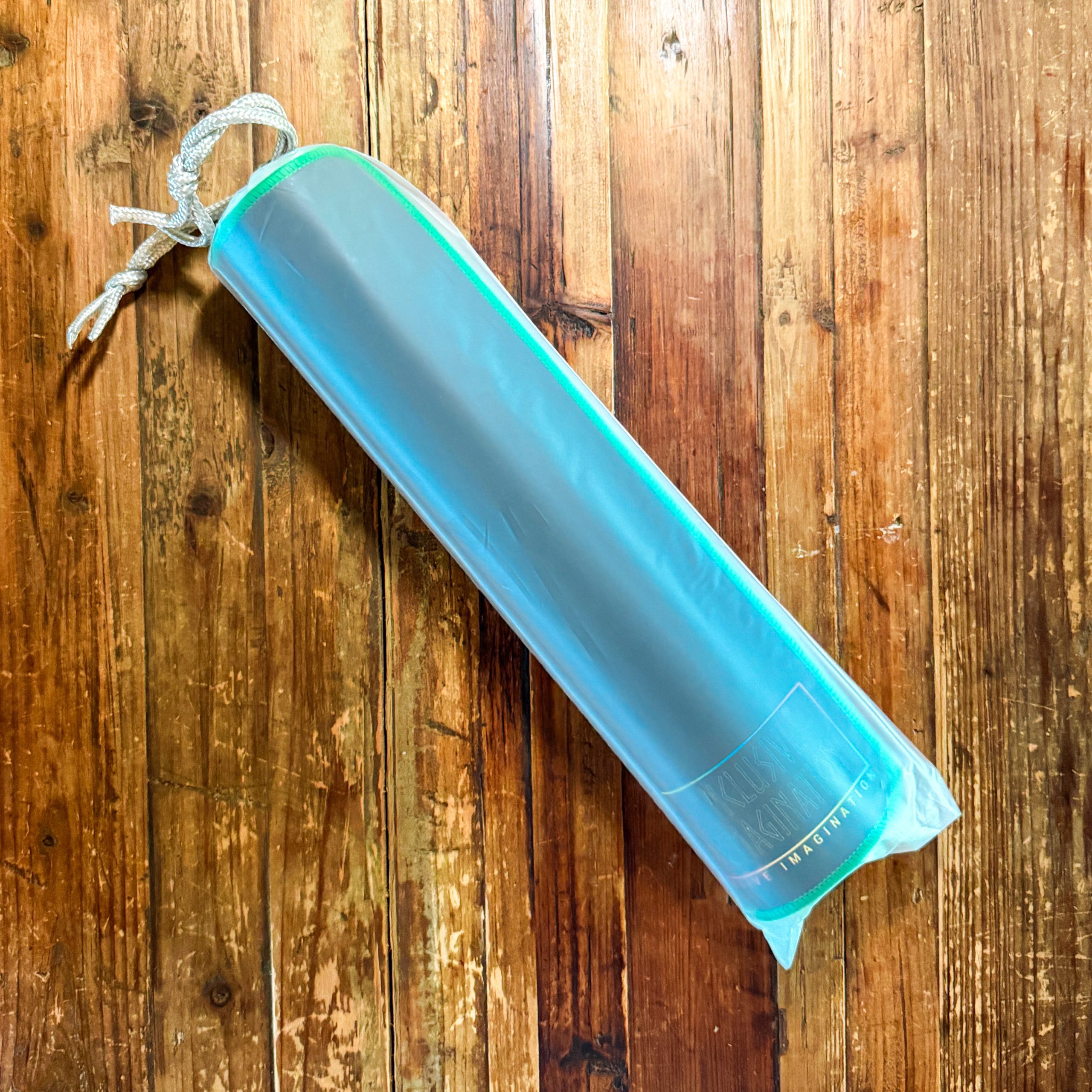 Rolled Green Playmat in Plastic Carry Bag